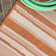 Tapis orange / crème Clarisa