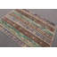 Tapis vert vintage parfait pour la salle à manger ou la cuisine avec un design anatolien turc unique