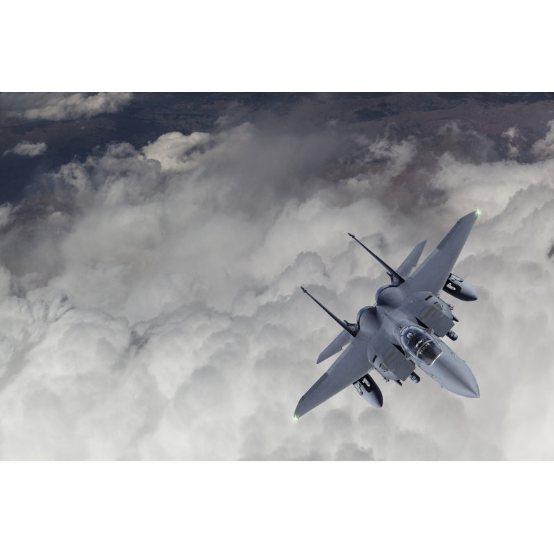 Fighter Jet Flying Over Clouds by Guvendemir, 24" H x 36" W