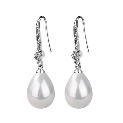 Boucles d'oreilles à la mode - Le design Agile se balance gracieusement, le savoir-faire exquis dans les détails, mettant en valeur le goût et le style personnel lorsqu'il est usé