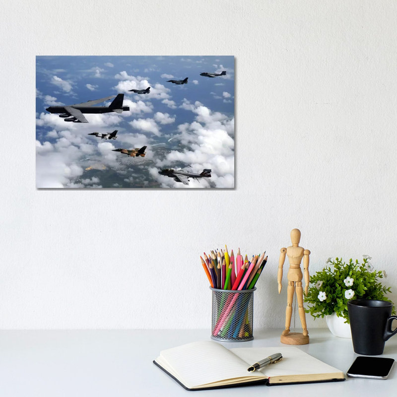 A B-52 Stratofortress Leads A Formation Of Aircraft Over Guam I by Stocktrek Images - Wrapped Canvas Print