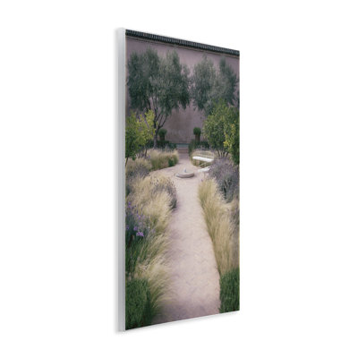 Art mural sur banc de jardin rond, par Deborah Revell
