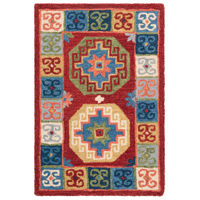 Vahakn Hand Tufted Wool/Cotton Southwestern Rug in Blue/Red