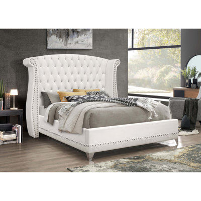 White Upholstered Eastern King Wingback Bed