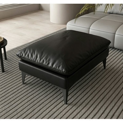 Repose-pieds en cuir avec coussin de duvet