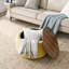 Repose-pieds rond avec rangement Dariyan-1046978745