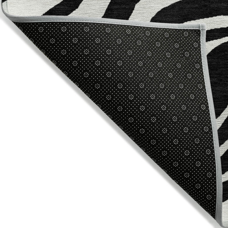 3' X 5' Black And Ivory Animal Print Washable Indoor Outdoor Area Rug