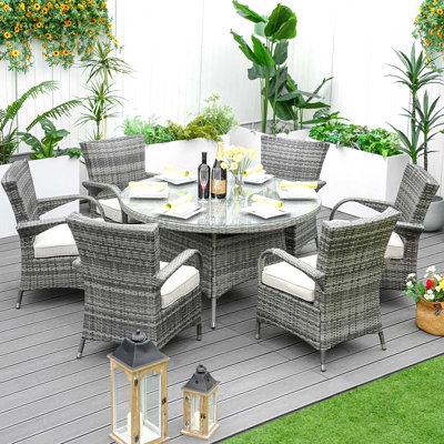 Round 6 - Person 53.14'' Long Dining Set With Cushions