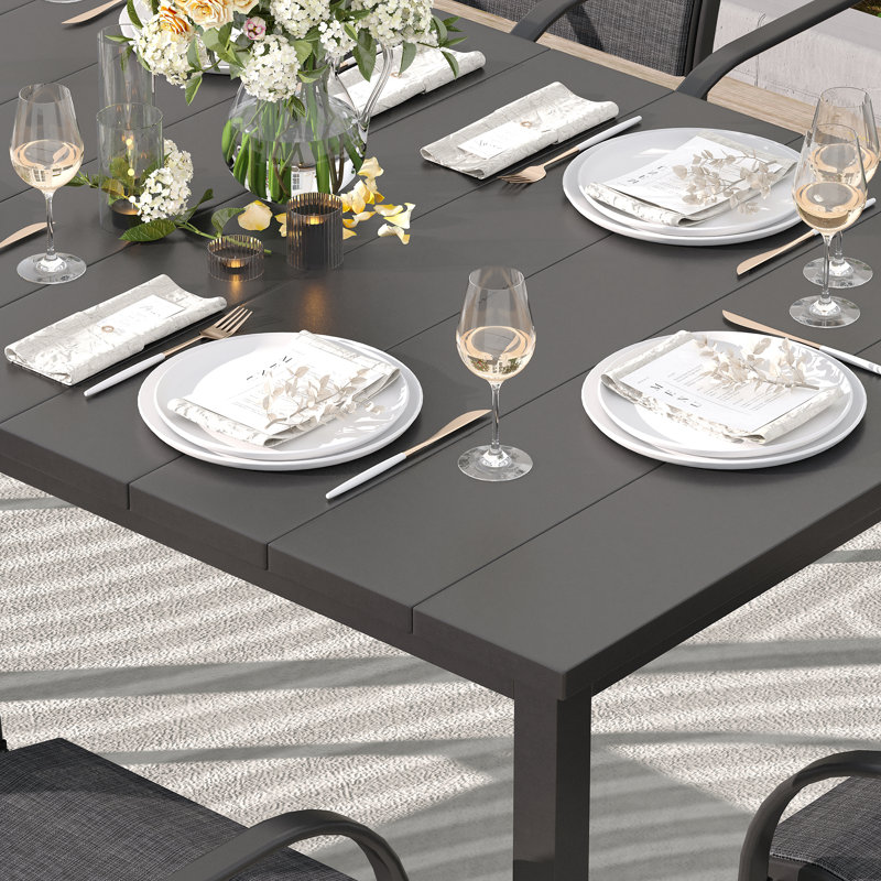 Ensemble repas d'extérieur pour patio avec table de salle à manger rectangulaire et bancs en faux bois, Noir