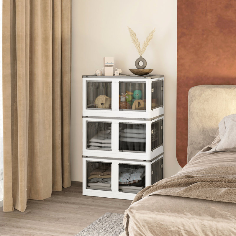 32 bacs de rangement empilables avec couvercles. 3 rangements pliables. Roues en plastique et 5 accès. Pliable pour économiser de l'espace. Empilage sécurisé. Blanc. Dimensions intérieures: l 27,25 po x P 17,75 po, H 15,25 po, 3 bacs