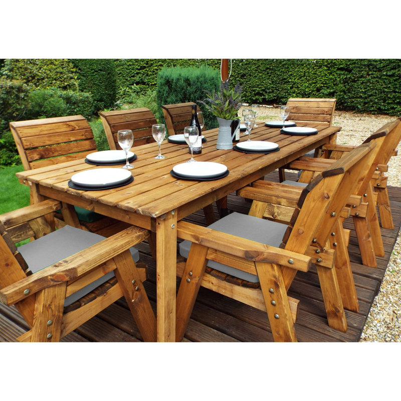 Finney 8 - Person Wood Patio Dining Set with Rectangular Table , Cushions Included, Grey