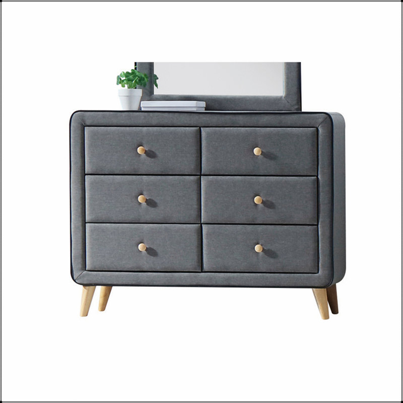 Commode en tissu gris clair Valda avec six tiroirs spacieux et un design moderne pour les chambres contemporaines