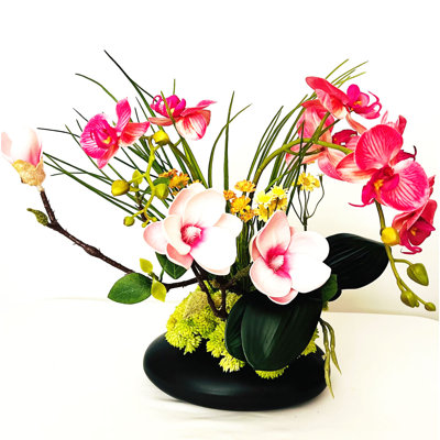 Artificial Flowers Arrangement in a Ceramic Vase