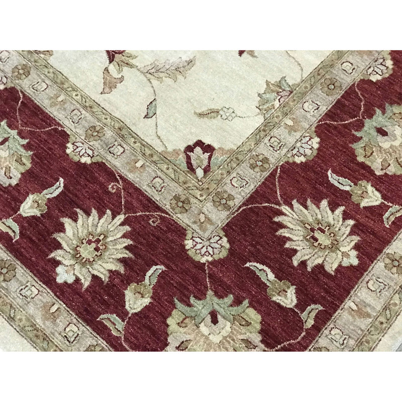 Tapis ivoire et rouge noué à la main de haute qualité