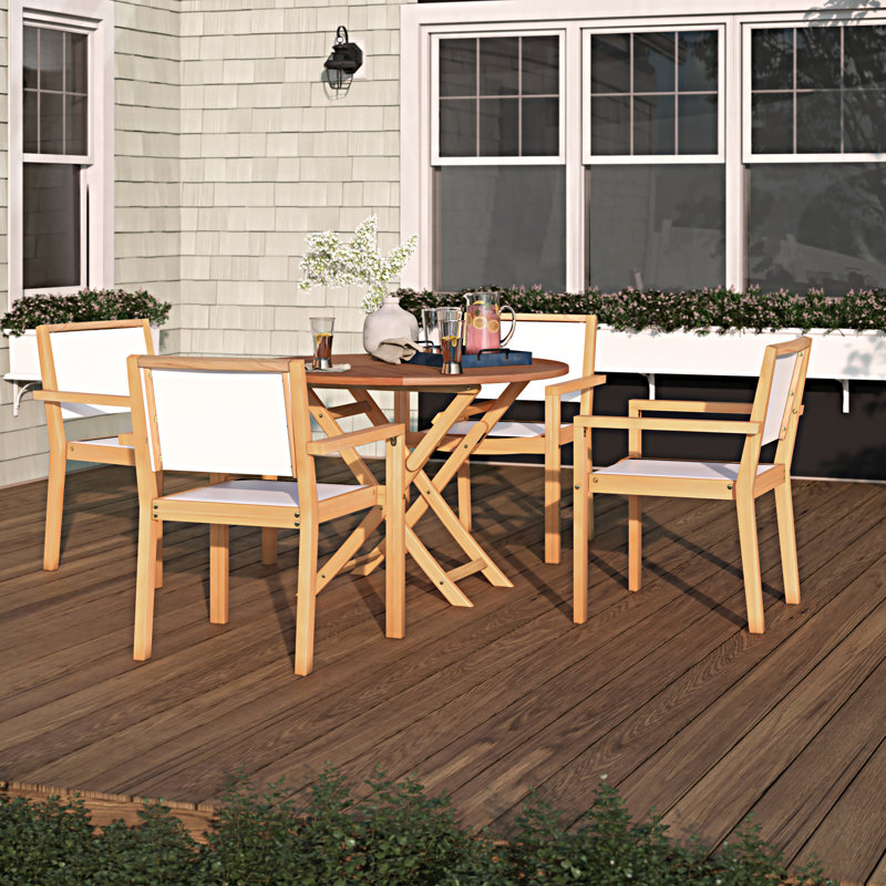 Keziah 4 - Person Patio Dining Set with Round Table