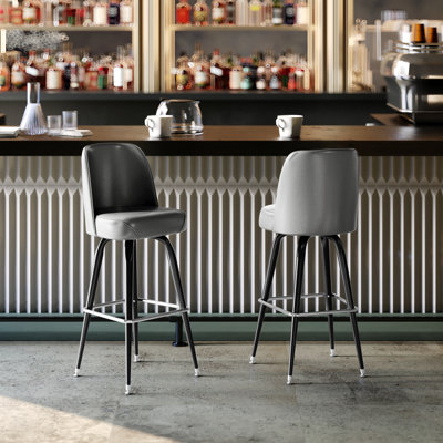 Tabouret de bar en métal avec siège pivotant revêtu de vinyle et repose-pieds James
