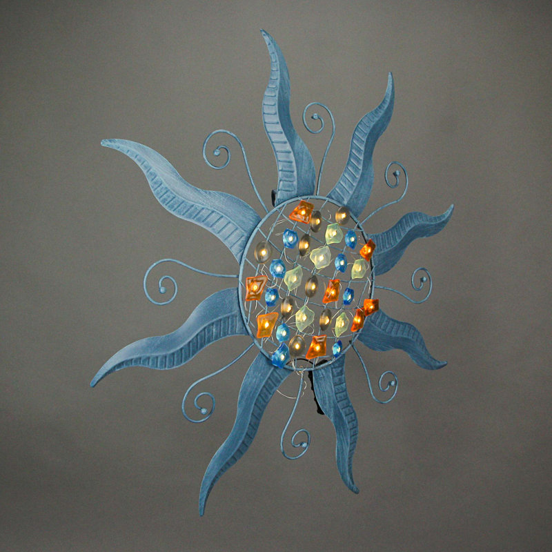 Décoration murale soleil en métal