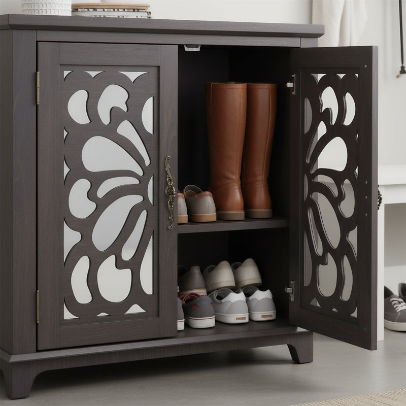 Un buffet avec fonctionnalité de rangement, avec deux portes d'armoire en miroir pour la vaisselle, convenant aux salons et aux cuisines.