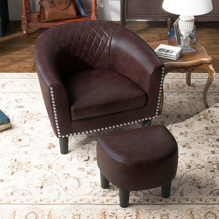 https://assets.wfcdn.com/im/64469079/resize-h755-w755%5Ecompr-r85/2702/270208063/Alverstone+28.4%22+Wide+Nailhead+Trim+Faux+Leather+Barrel+Chair+and+a+Ottoman.jpg