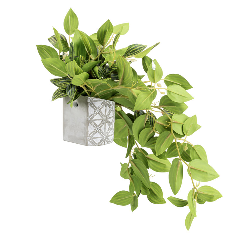 Fausse plante artificielle en pot de ciment