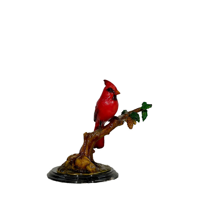 Sculpture bronze sur un plateau de table cardinal sur une branche