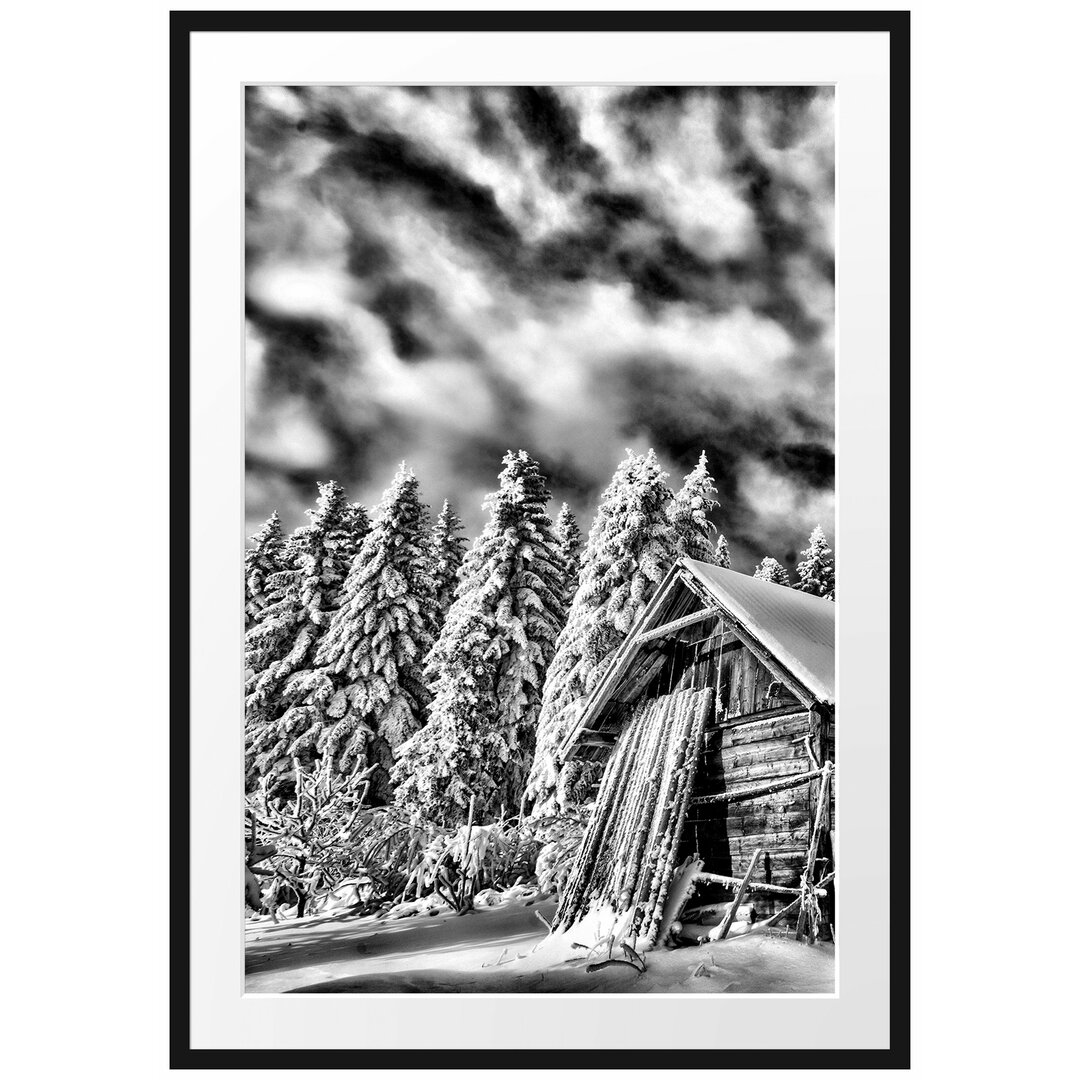 Gerahmtes Poster Holzhütte im Schnee