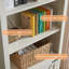 Chimira Farmhouse 69.8" H x 31.4" W 5 Tier Bookshelf with Adjustable Shelves & Barn Door, White-262987114