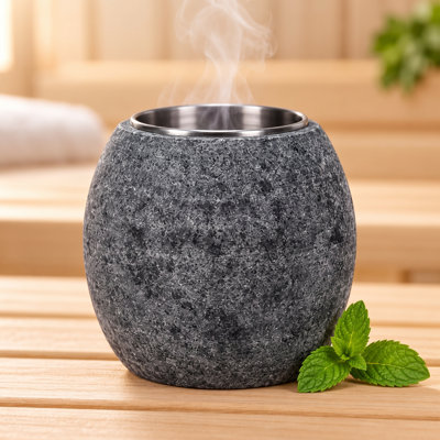 Diffuseur d'huiles essentielles pour sauna en granit naturel massif avec insert amovible en acier inoxydable, porte-huiles essentielles et accessoires pour saunas traditionnels et infrarouges.