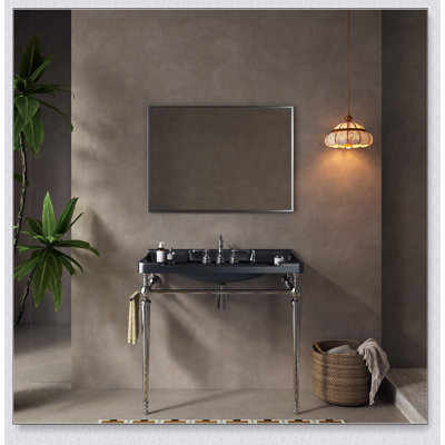 Évier de console mural en céramique avec 3 trous de robinet et pieds en acier inoxydable, idéal pour les salles de bain modernes et peu encombrantes.