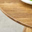 Table basse avec un design rond compact et une texture de grain de bois naturel, 19,6 po de diamètre, panneau de fibres à densité moyenne brun