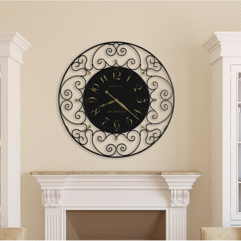 Joline Metal Analog Wall Clock