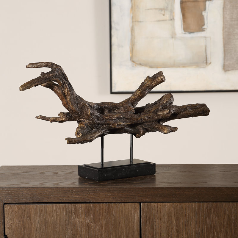 Branche de sculpture dorée