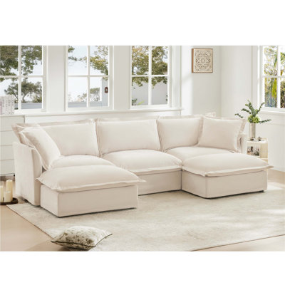 Canapé modulaire confortable et élégant avec bords français distinctifs pour un environnement de salon relaxant et divertissant
