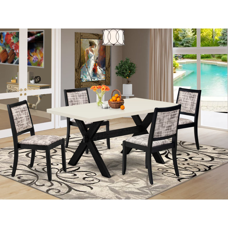 Ensemble de salle à manger 5 pièces comprenant une table avec plateau et 4 chaises empilables, revêtues d'un tissu polyester à motifs blancs et gris et de finitions noires brossées.