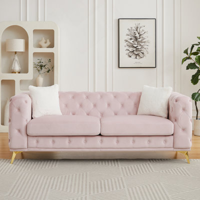 Canapé en velours de luxe de 82,5 pouces avec accents matelassés Chesterfield et pieds en métal, comprenant 2 coussins.