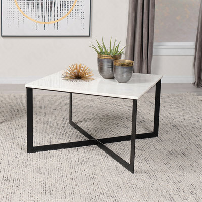 Table basse blanche et noire à plateau carré en marbre