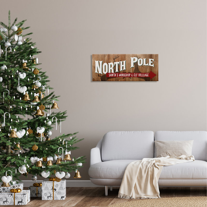 Rustic North Pole with Arrow Framed Giclee Art by Kim Allen, 13" H x 30" W x 1.5" D, White Frame
