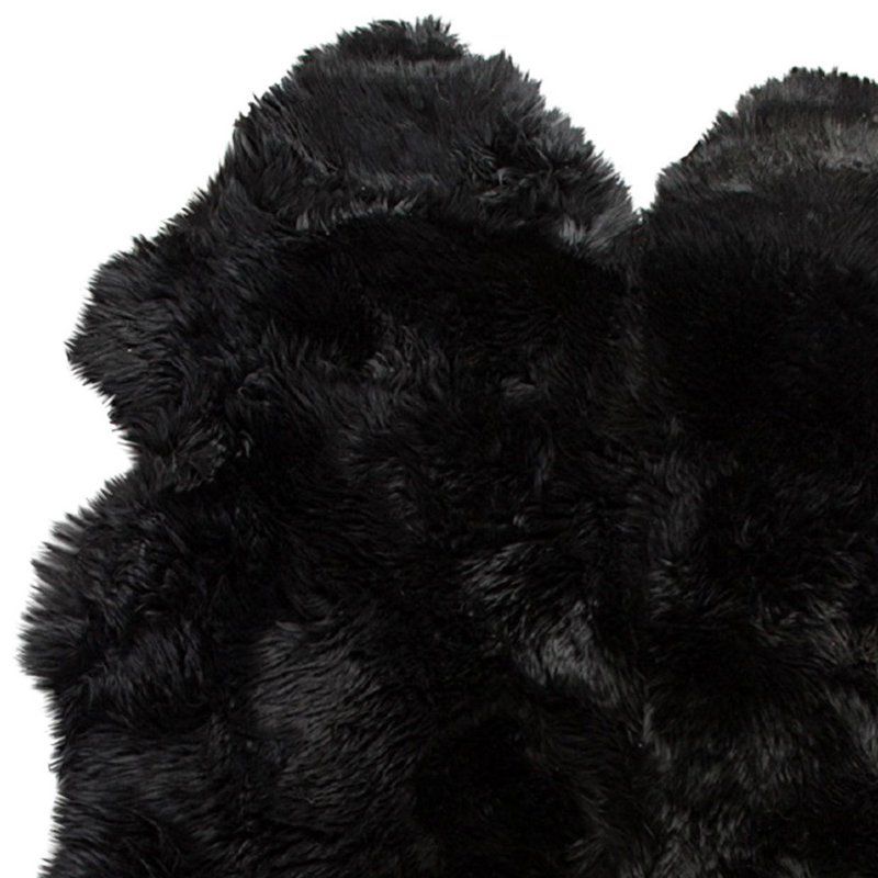Tapis noir à imprimé animal