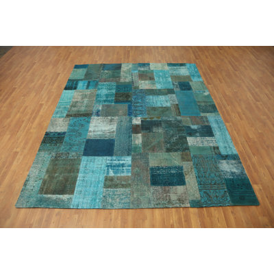 Tapis délavé en laine turquoise 8 x 10