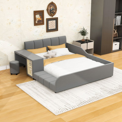 Lit plateforme tapissier luxueux en velours avec bureau, tabouret rond et rails de sécurité
