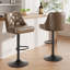Tabouret de bar rotatif à 360 degrés en faux cuir avec coutures à boutons-116087023