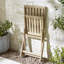 Table de salle à manger d'extérieur en bois massif Annily avec 4 chaises pliantes - pour patio moderne