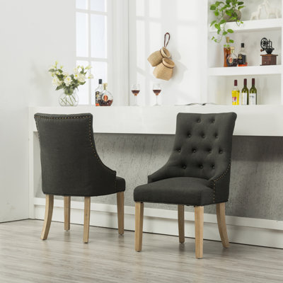 Ensemble de 2 fauteuils à oreilles capitonnés avec têtes de clou et chaise d'appoint