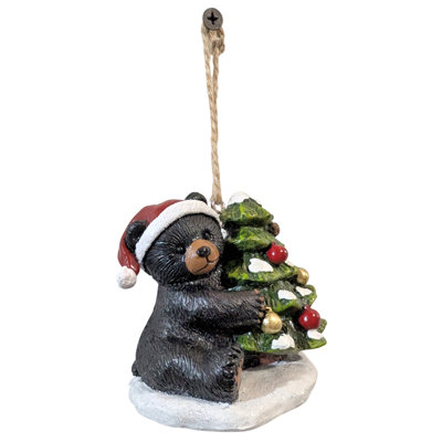 Ornement en forme de chapeau par un arbre de Noël