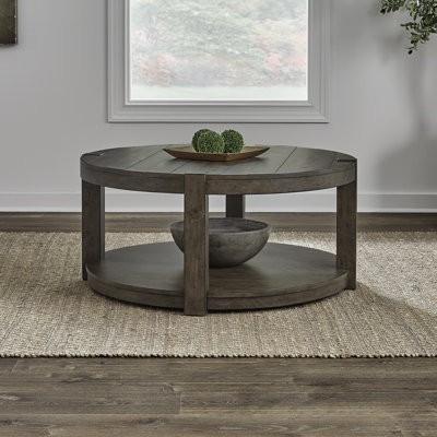 Arnaline Round Cocktail Table w/ Floor Shelf