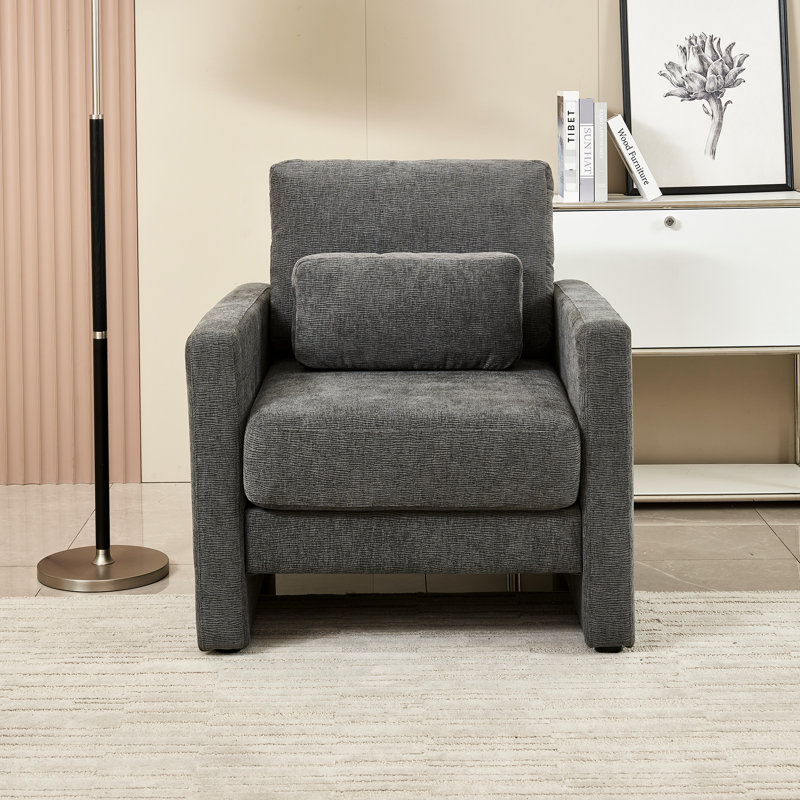 Le fauteuil Classy Modern en chenille avec base en bois massif assure une position assise confortable dans diverses pièces.