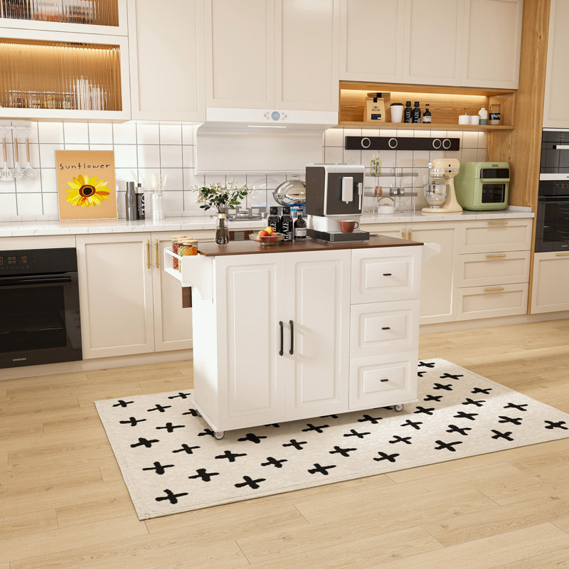 Chariot pour îlot de cuisine avec plateau de table pliable et trois tiroirs de rangement