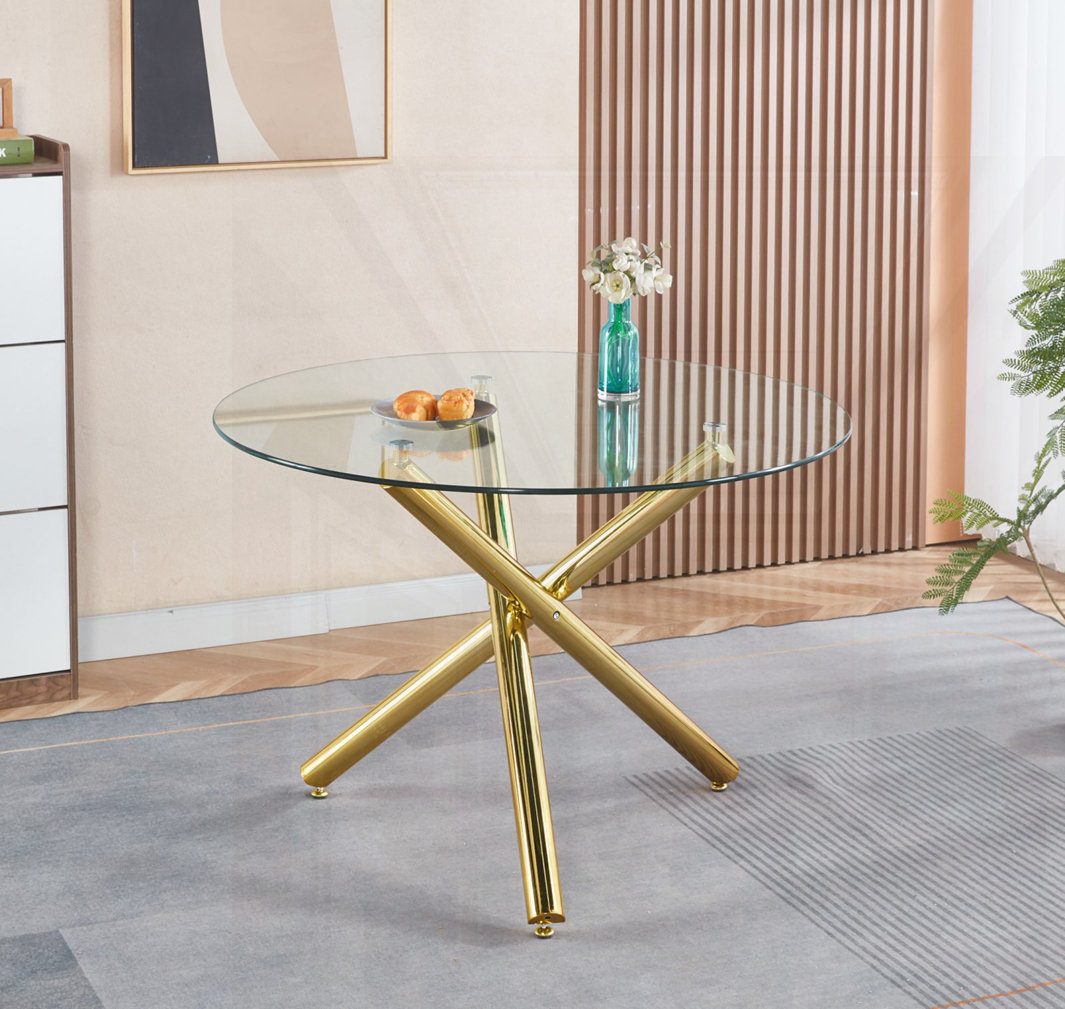 Ivy Bronx Dining Table with metal leg and glass - Wayfair Canada