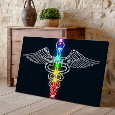 La toile crée une illustration vibrante et mystique mettant en vedette un symbole d'art caducée stylisé orné d'ailes complexes et un art mural sur toile