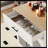 80" Expandable Kitchen Island With Dining Table, Solid Wood Grain Countertop & Power Outlet, Mobile Storage Cart With Cabinet & 2 Drawers, White